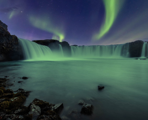 Northern Lights over a waterfall
